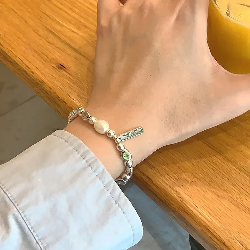 سوار اللؤلؤ الفضي